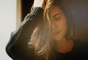 Woman pulling hair